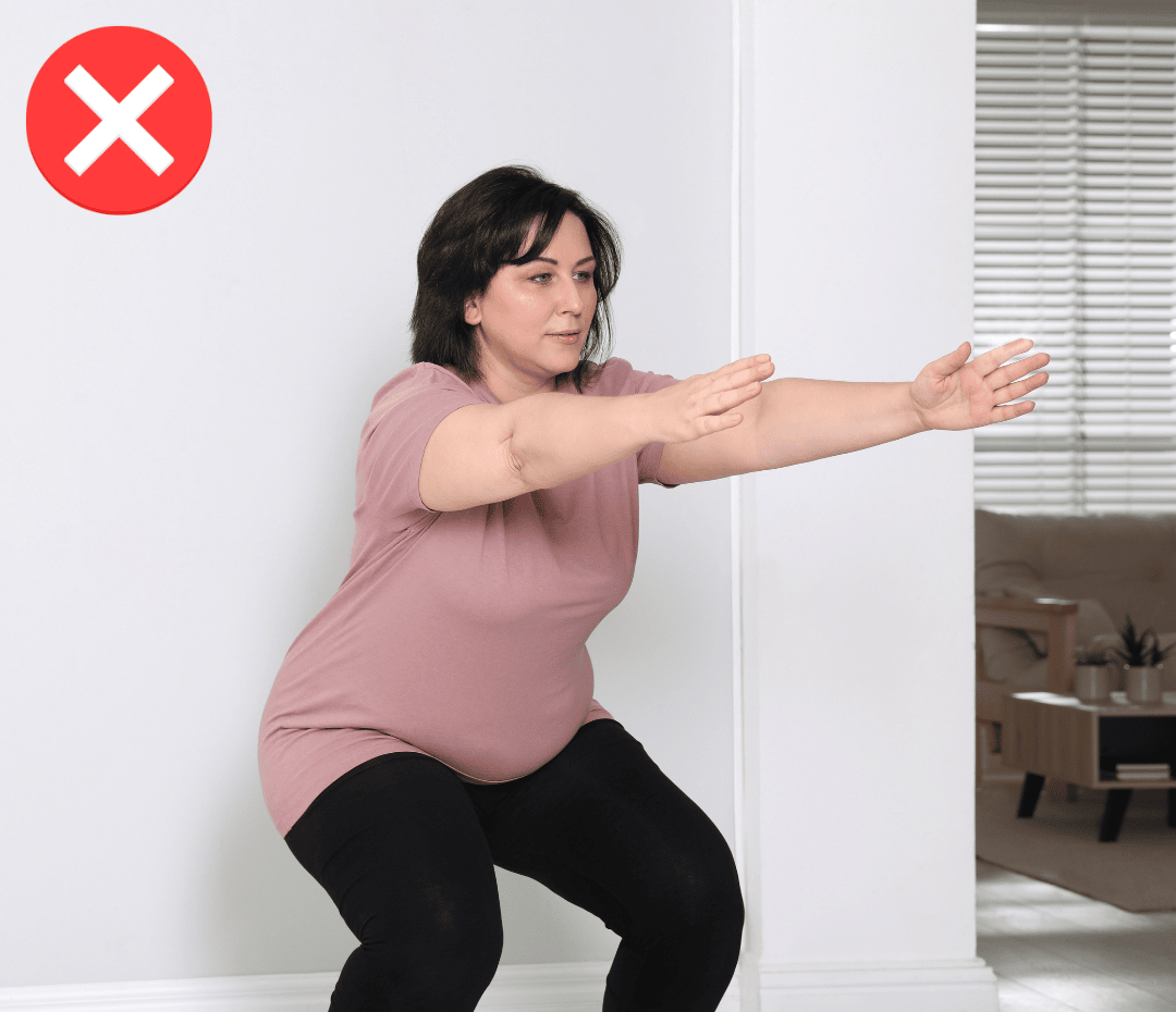 Woman over 50 trying to exercise at home without guidance, illustrating why personalized support and proper form are crucial for staying active and injury-free after 50.